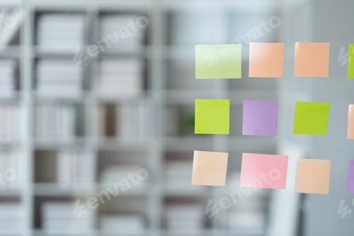 Preview: Business planning concept and sticky note on glass wall for information reminder.