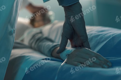 Preview: Doctor assisting a young patient at the hospital