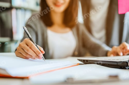 Preview: Asian woman students are reading and discussing about exam preparation. presentation, study for test