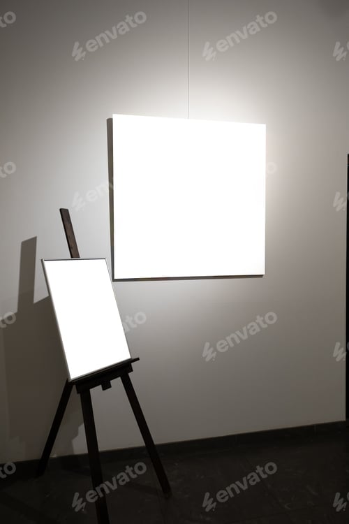 Preview: Blank picture frames on grey wall with glowing lamp, mock up