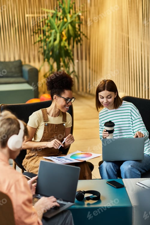 Preview: Engaging colleagues discuss project ideas during an inspiring hotel retreat