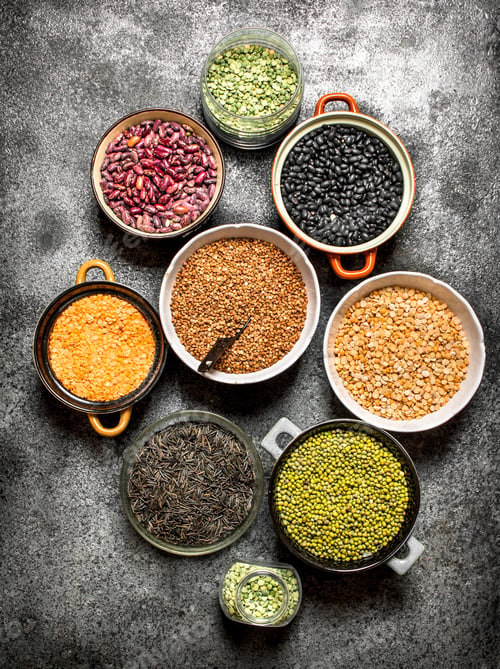 Preview: Bowls of Colorful Dried Legumes on Dark Background