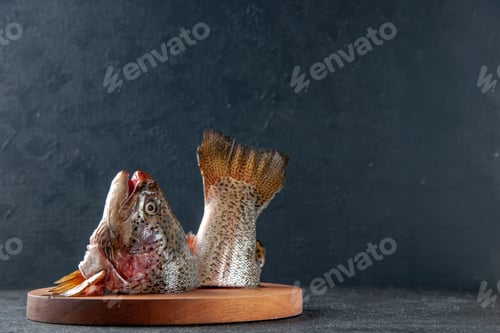Preview: front view fresh sliced fish on dark blue background seafood meal water sea meat food meal