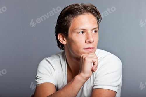 Preview: Teenage Boy With Brown Hair And Eyes. Wearing White T-Shirt. Good Looking. Casual Wear