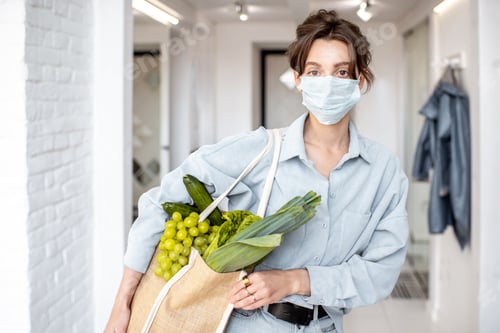 Preview: Woman in medical mask shopping food
