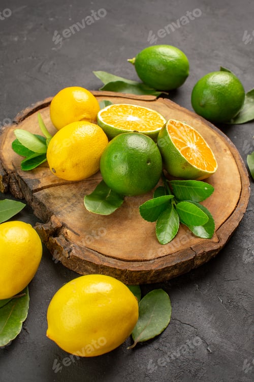 Preview: front view fresh sour lemons on dark background fruit lime citrus