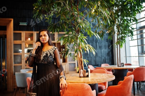 Preview: Pretty indian girl in black saree
