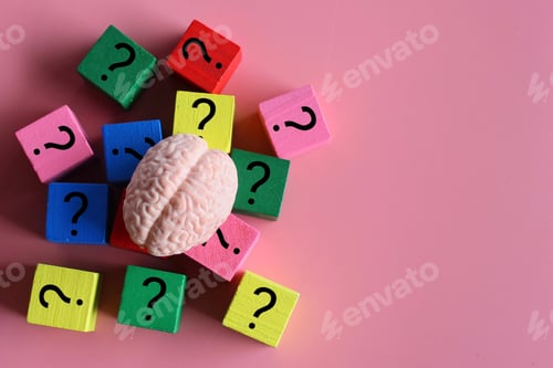 Preview: Top view image of brain and wooden cubes with question mark icon.
