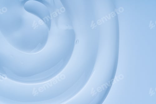 Preview: Close-up shot of blue liquid cosmetic gel or serum makeup swatches with a glossy, shiny texture