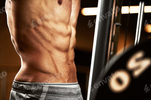 Preview: Closeup portrait of a muscular man workout with barbell at gym. Brutal bodybuilder athletic man with