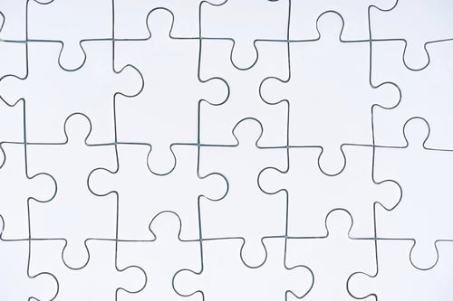 Preview: full frame of white puzzle pieces background