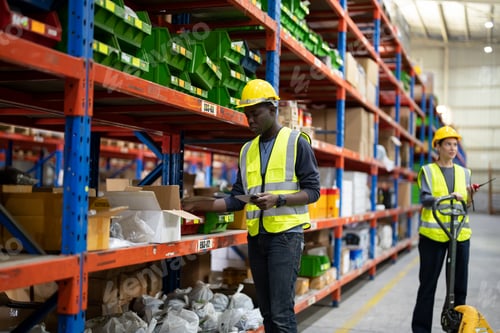 Preview: Warehouse workers checking the inventory.