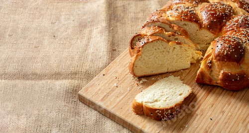 Preview: Easter sweet bread, greek tsoureki, brioche braid slice on table, close up view