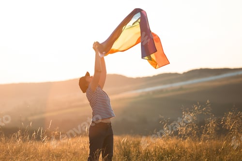 Preview: Young woman with LGBT flag.