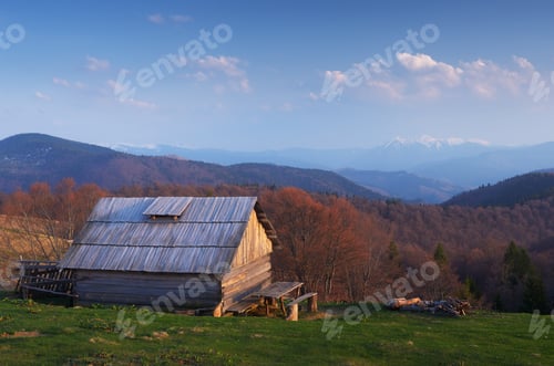 Preview: Wooden house in mountains
