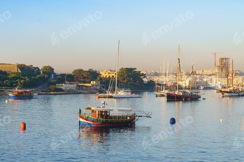 Preview: Traditional boats, ferries and yachts on Sliema gulf, Malta.
