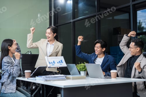 Preview: businessman with laptop, tablet pc computer and papers having discussion in modern office.