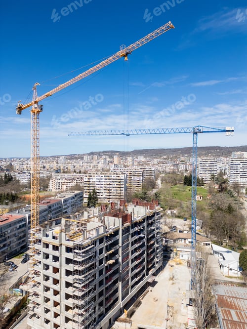 Preview: Busy Construction Site With Cranes and Buildings