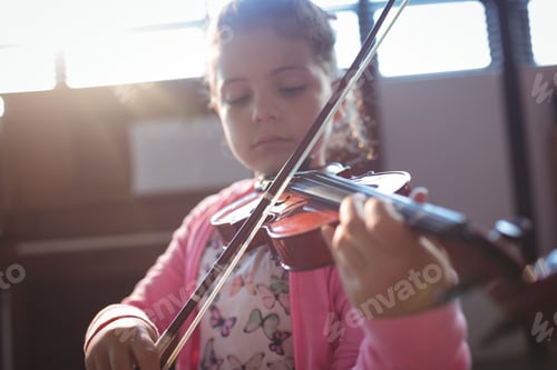 Preview: Girl student rehearsing violin