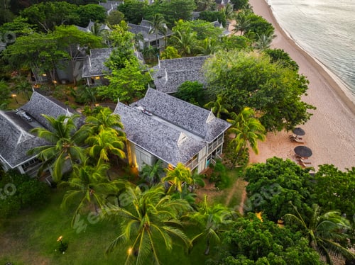 Preview: Tranquil beachfront at dusk in Le Morne