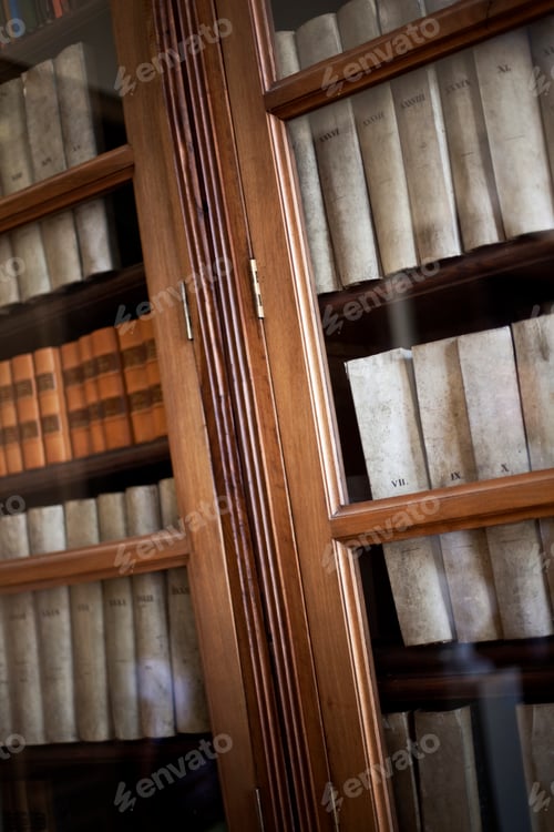 Preview: Old Books Behind Glass in a Wooden Bookcase