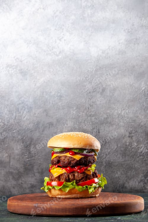 Preview: Tasty sandwich on brown wooden cutting board on ice background
