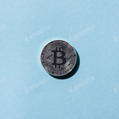 Preview: top view of silver bitcoin on blue background