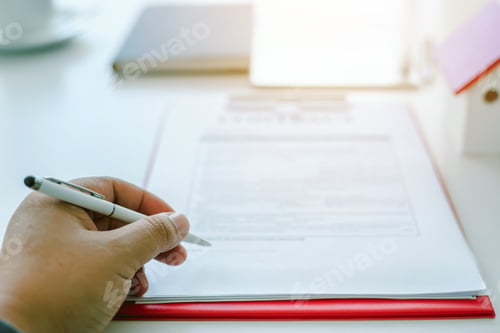 Preview: Businessman sign the contract agreement on the document. Signing of a contract to buy or sell busine
