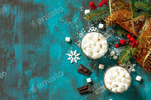 Preview: Hot Chocolate with Marshmallows on a blue stone or concrete table. Top view flat lay background.