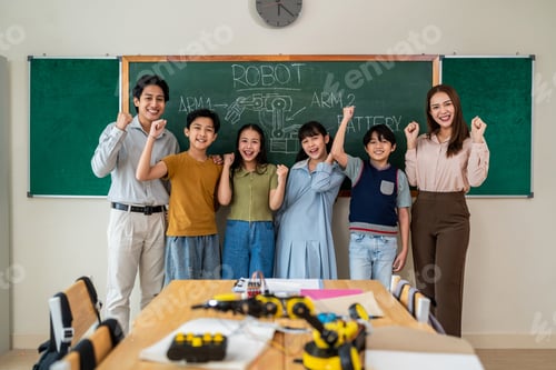 Preview: Portrait of Asian adorable student standing with teachers at school.