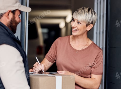 Preview: Shot of a young woman signing for a delivery from the courier