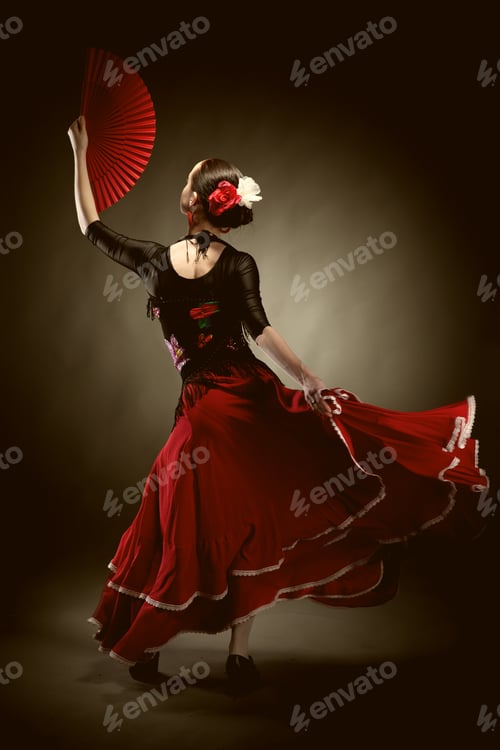 Preview: young woman dancing flamenco on black