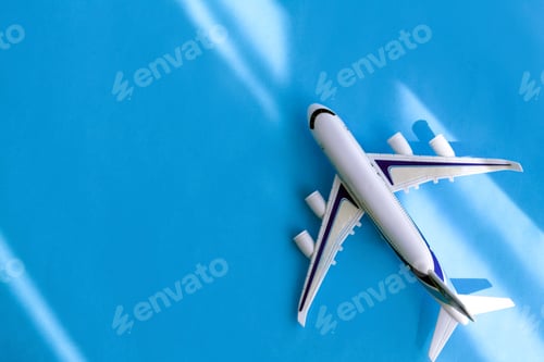 Preview: Plane model on a blue background . Copy space.