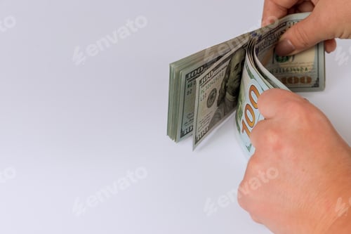 Preview: Hands women counting paper money, US dollars in the white background