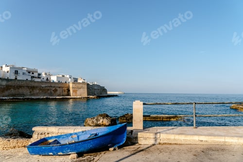 Preview: View of the bay of the tourist Italian village of Monopoli, with abandoned skiffs