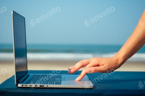 Preview: laptop on the beach