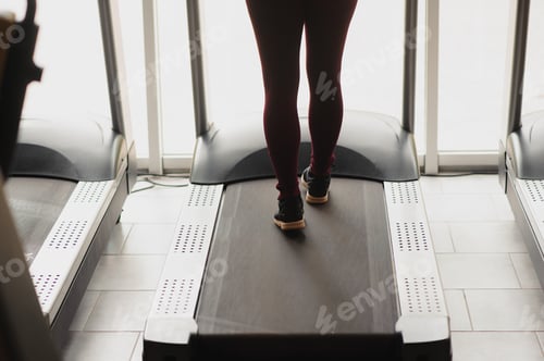 Preview: Woman was running on the treadmill in the gym