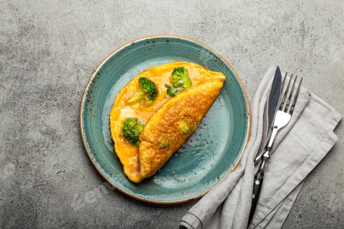 Preview: Healthy omelette with broccoli on plate top view