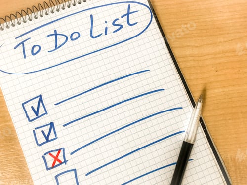 Preview: to do list checklist hand written on notepad paper lay on wooden table. pen lay on notepad