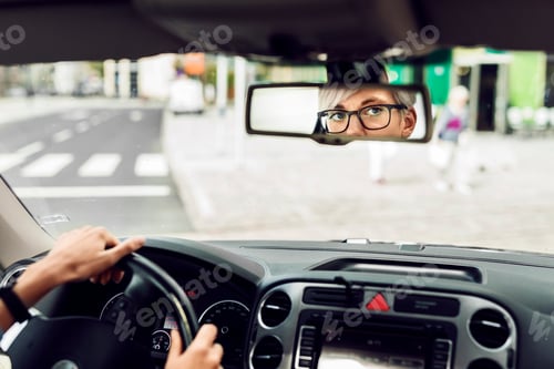 Preview: Woman driving car