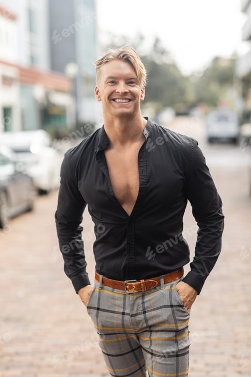 Preview: Stylish blonde man smiles