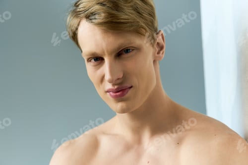 Preview: Capturing modern masculinity through a young mans alluring gaze and confident demeanor