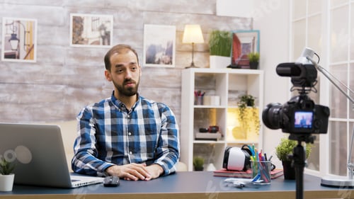 Preview: Caucasian vlogger recording a podcast for social media