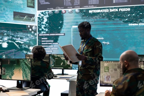 Preview: Military secret service staff monitoring air traffic activity in control center