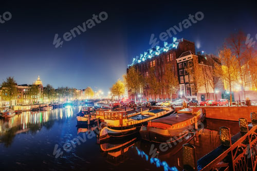 Preview: Beautiful night in Amsterdam. illumination of buildings an