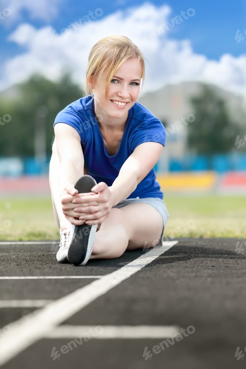 Preview: Woman Doing Core Workout At A Stadium