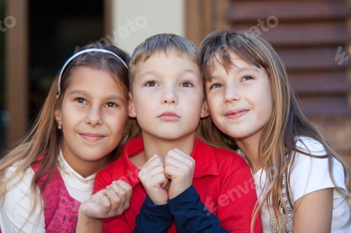 Preview: Portrait of Children Gazing Up with Curiosity