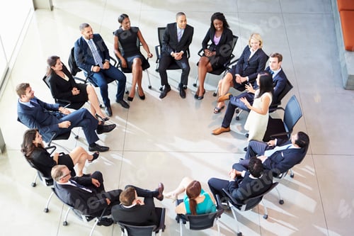 Preview: Businesswoman Addressing Multi-Cultural Office Staff Meeting