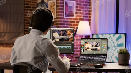 Preview: Graphic designer editing video montage on production software