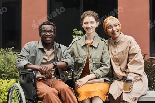 Preview: Group of multi-ethnic friends outdoors